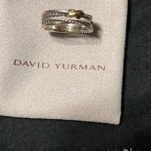 David Yurman Ring, sterling silver and 18k gold. Size at 8.5 but runs tight.